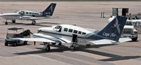 N4652N @ TJSJ - A Cape Air Cessna sits, surrounded by ground support equipment at SJU. - by Daniel L. Berek