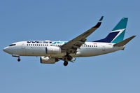 C-FWBL @ CYVR - 2003 Boeing 737-7CT, c/n: 32750 - by Terry Fletcher