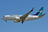 C-FIWJ @ CYVR - 2007 Boeing 737-7CT, c/n: 30712 - by Terry Fletcher