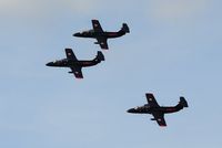 G-DLFN @ EGFH - Red Star Rebels second three ship formation practice session. G-DLFN as Rebel 3 in a topside pass over Swansea Airport led by G-DELF (Rebel 1) with G-BYCT (Rebel 2). - by Roger Winser