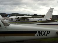 ZK-MYF @ NZAR - Peeking out behind MXP - by magnaman