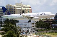 N407UA @ TNCM - N407UA