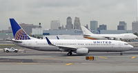 N37420 @ KEWR - A new extended range version of Boeing's longest 737 taxies by at EWR. - by Daniel L. Berek