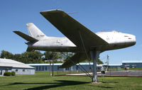 53-1338 @ BVI - a pair of fouga magisters are parked close to this F-86 - by olivier Cortot