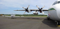 N2426F @ KTTN - Taken at KTTN in May 2012 parked next to a massive Civilian C130. - by rallyr