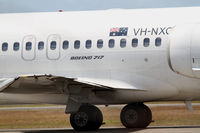 VH-NXQ @ YBBN - QantasLink Boeing 717