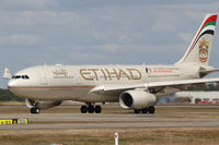 A6-EYJ @ YBBN - Etihad Airbus A330 - by Thomas Ranner