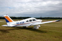 SE-KOR @ ESKD - Piper Archer parked at its home base Dala-Järna airfield, Sweden. - by Henk van Capelle