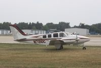 N7210C @ KOSH - Beech 58 - by Mark Pasqualino