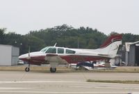 N5812K @ KOSH - Beech B55 - by Mark Pasqualino