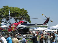 N133EH @ CMA - 1982 Messerschmitt-Bolkow-Blohm Gmbh BO105 CBS4 of Red Bull, two Rolls Royce Allison 250 C20 Turboshafts 420 shp each. Modified. Only helo approved by FAA for unlimited aerobatics (except outside loops)-big crowd! - by Doug Robertson