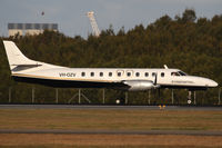 VH-OZV @ YBBN - Brindabella Airlines Fairchild (Swearingen) SA227 Metro - by Thomas Ranner