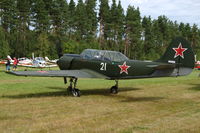 SE-KDD @ ESKD - Yak-52 with red stars parked at Dala-Järna airfield, Sweden. - by Henk van Capelle