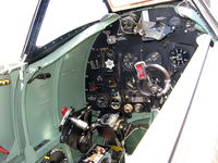 N749DP @ CMA - 1983 Vickers/Supermarine SPITFIRE Mk.XIVe, Rolls Royce GRIFFON 65 V-12 2,050 Hp, cockpit panel with typical British loop stick for ailerons and elevator control - by Doug Robertson