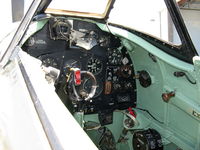 N749DP @ CMA - 1983 Vickers/Supermarine SPITFIRE Mk.XIVe, Rolls Royce GRIFFON 65 V-12 2,050 Hp, cockpit panel from other side - by Doug Robertson