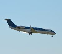 C-GNVC @ CYOW - Approaching rwy 32 on final at high noon. - by Dirk Fierens