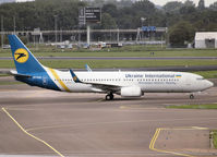 UR-PSC @ AMS - Taxi to the gate of Schiphol Airport - by Willem Göebel
