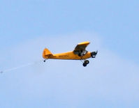 N929SC - A hard-working Piper Super Cub tows banners over the northern coast of old San Juan, PR. - by Daniel L. Berek