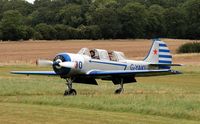 G-YAKI @ EGHP - Ex: DOSAAF 100 Yellow > LY-ANM > G-YAKI - Originally in private hands in September 1994 and currently owned to, Yak One Ltd since November 1994. - by Clive Glaister