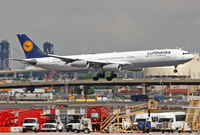 D-AIGO @ KEWR - A LH A340 battles cross-winds as it maneuvers EWR's smallest runway. - by Daniel L. Berek