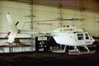 G-BBOS @ CAX - Bell 206B JetRanger of British Executive Air Services (BEAS) hangered at Carlisle in the Summer of 1978. - by Peter Nicholson