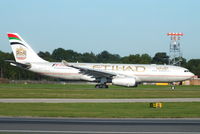 A6-EYD @ EGCC - Etihad Airways - by Chris Hall