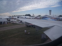N220AU @ OSH - The view of oshkosh from a Dc-10-10 - by christian maurer