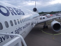 N220AU @ OSH - the view of the side of a dc-10 - by christian maurer