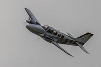 N241WB @ EGJA - Banking round a course marker and just about to pass in front of the hazy sun - not an ideal photographic position - by alanh