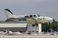 N979DM @ KOSH - Beech E55 - by Mark Pasqualino