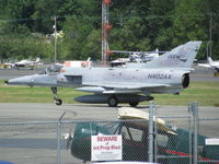 N402AX @ KBFI - N402AX Landing at Boeing Field Seattle - by AC