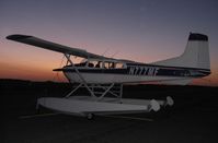 N777MF @ KAXN - Cessna A185F Skywagon on the line at dusk. - by Kreg Anderson