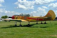 N713YK @ KOSH - Yakovlev Yak-52 [9010911] Oshkosh-Wittman Regional Airport~N 30/07/2008 - by Ray Barber