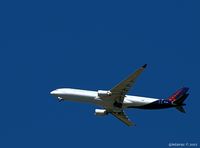 OO-SFV - On approach to JFK, over Mineola, NY - by gbmax