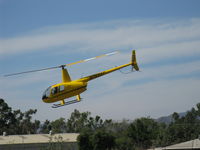 N7523T @ SZP - 2004 Robinson R44 RAVEN II, Lycoming O-540 derated to 245 Hp for 5 minutes, 205 Hp continuous, refinished-color me sold-departure - by Doug Robertson