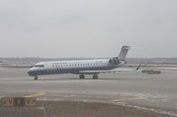 N745SK @ DTW - United Express CRJ-700 taken out of the dirty window of N744P - by Florida Metal