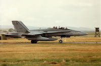 188924 @ EGQS - CF-188B Hornet of 433 Squadron Canadian Armed Forces preparing to join Runway 23 at RAF Lossiemouth in September 1993. - by Peter Nicholson