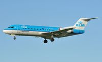 PH-KZV @ EGSH - One of the regular daily Norwich to Amsterdam flights landing into the sun. - by keithnewsome