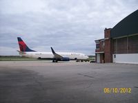 N392DA @ KLAF - After http://flightaware.com/live/flight/DAL8914/history/20121006/2140Z/KCVG/KLAF waiting to the the University of Michigan football team home. - by Brad