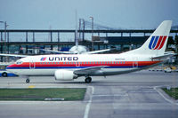 N927UA @ KORD - June 1992 - taxiing at ORD - by John Meneely