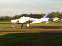 ZK-DEM @ NZAR - A bit too sunny - but had to take from behind fence. - by magnaman