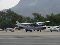 N704UT @ SZP - 1976 Cessna 150M, Continental O-200 100 Hp, landing Rwy 22 - by Doug Robertson