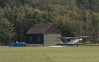 G-EBWD @ EGTH - Richard Shuttleworth's 1937 Railton and his DH60X Moth (about to fly) in front of the Original Hanger at the Shuttleworth Collection.
