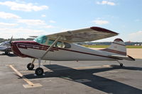 N1839C @ KCGI - Had to crawl behind bushes and shoot through the fence for this one! - by Glenn E. Chatfield