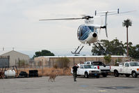 N105JL @ L67 - Hooking up the load. - by Marty Kusch