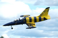 YL-KSL @ ESKD - Crazy flying number 5 of the Baltic Bees Jet team during a display at Dala-Järna airfield, Sweden. - by Henk van Capelle