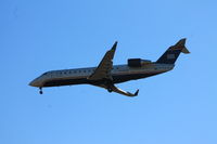 N406AW @ KBDL - Air Wisconsin flight 3784 from Reagan National on final for runway 6. - by Mark K.