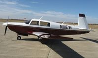 N111EW @ KAXN - Mooney M20K on the ramp.