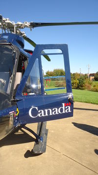 C-FYZE @ KOQN - Co-pilot door and Canada markings - by George A.Arana