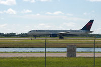 N6716C @ RSW - 757 taking off RWY 6 destination DTW